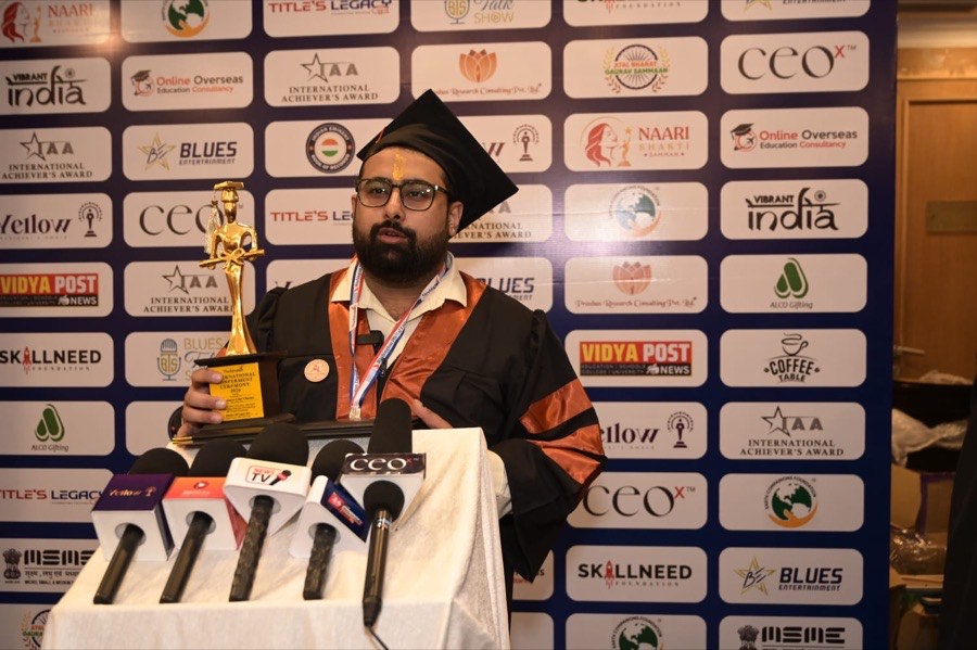Speaking to the press with his trophy